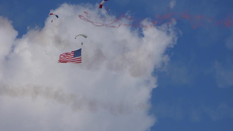 P1000920.JPG - American Flag coming down