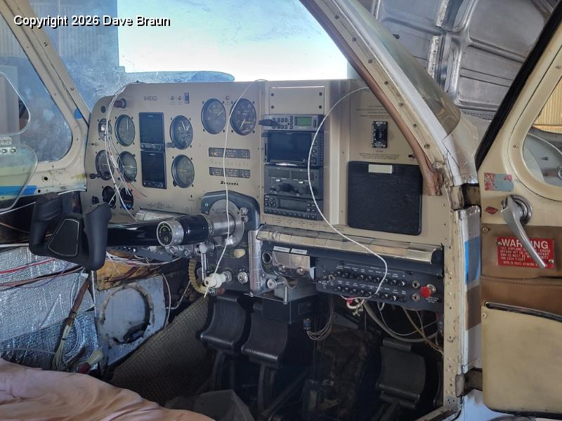 2024-11-19 13.17.59.jpg - Control column installed. The wires dangling over the panel are for the Push To Talk switches, the autopilot disconnect, electric trim, and other functions which need the control wheel switches and coiled cord installed.