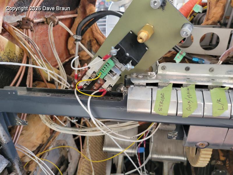 2024-04-07 19.18.15.jpg - Working on the LH breaker panel which serves the equipment and instruments on the LH side of the panel. Note that the piano keys are labeled because I kept forgetting which was which without the labeling on the instrument panel.