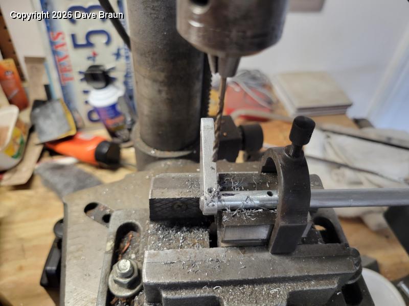 2024-12-01 14.11.33.jpg - Drilling roll pin holes into the new solid aluminum actuating bars.