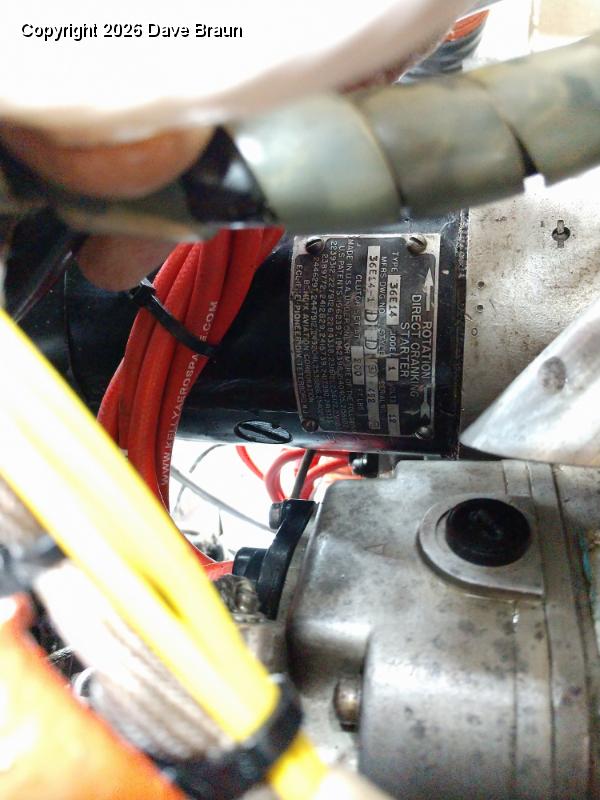 Starter information plate.jpg - The data plate on the 36E14-1 starter. Perferred by some over the E-80 for its gentle engagement. However, this one is turning slowly. Installed in 1988, repaired in 91 and 06.