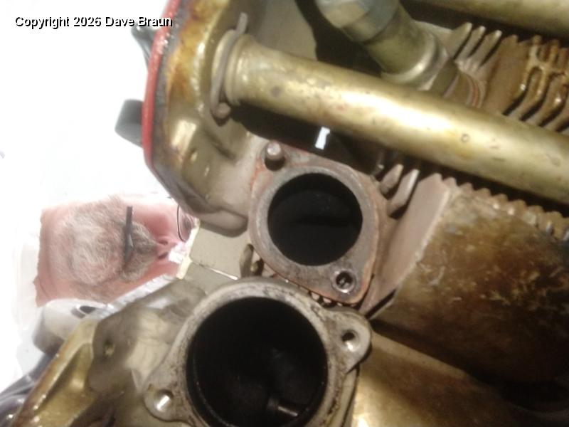 2020-08-14 09.49.01.jpg - Inserting the Helicoil. See the insertion tool in my mouth? That might be a bad habit.