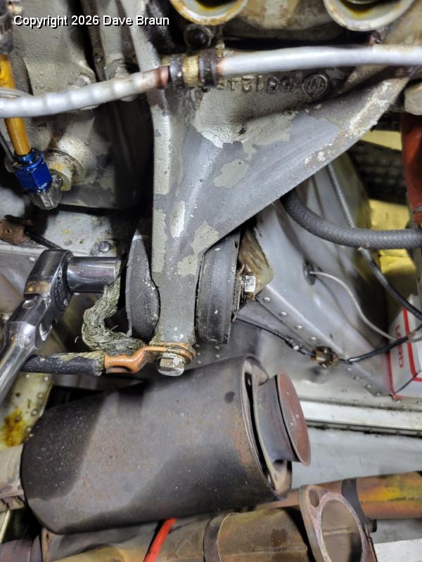 2023-03-29 18.23.19.jpg - Removing a rear mount nut. Note this is the longer one that is able to handle the braided ground.