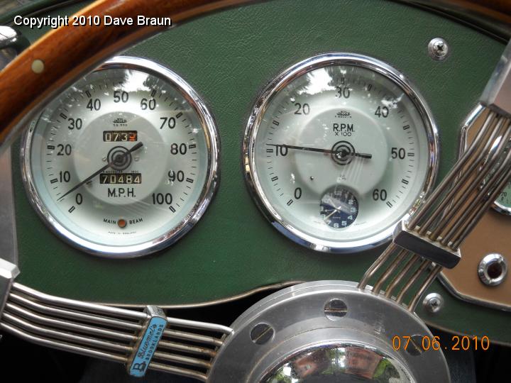 DSCN0949.JPG - Only a disassembly and clean up of the faces was needed to make his gauges look this nice. A rare dished Brooklands wheel and a quartz clock face complete the look.