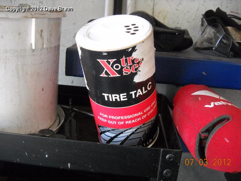 Talc to prevent inner tube wear.jpg - Tire talc was absent on the other vendor's approach, and we suffered a flat on the rear in less than 200 miles because of it. It provides some friction relief between the inner tube and the flexing of the tire and is essential to prevent holes from forming in the inner tubes.