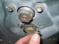 Long screws on regulator plate