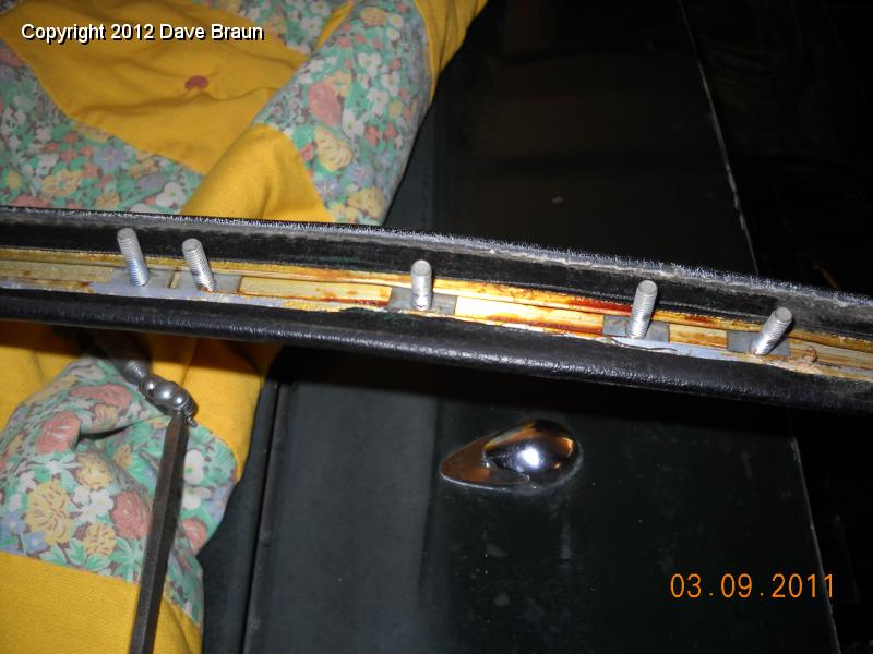 Rear deck trim bow and fasteners.jpg