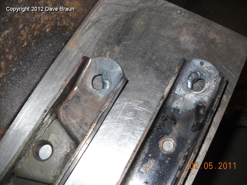 Weld Material added to re-round holes.jpg