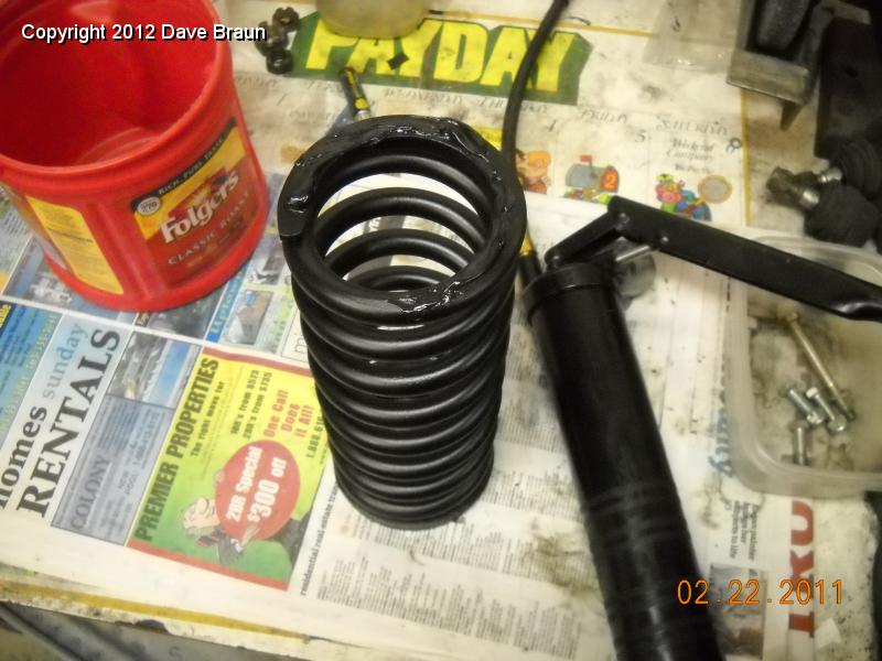 greasing front coils.jpg