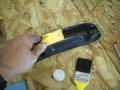 Cleaning old adhesive and sanding header rail 02