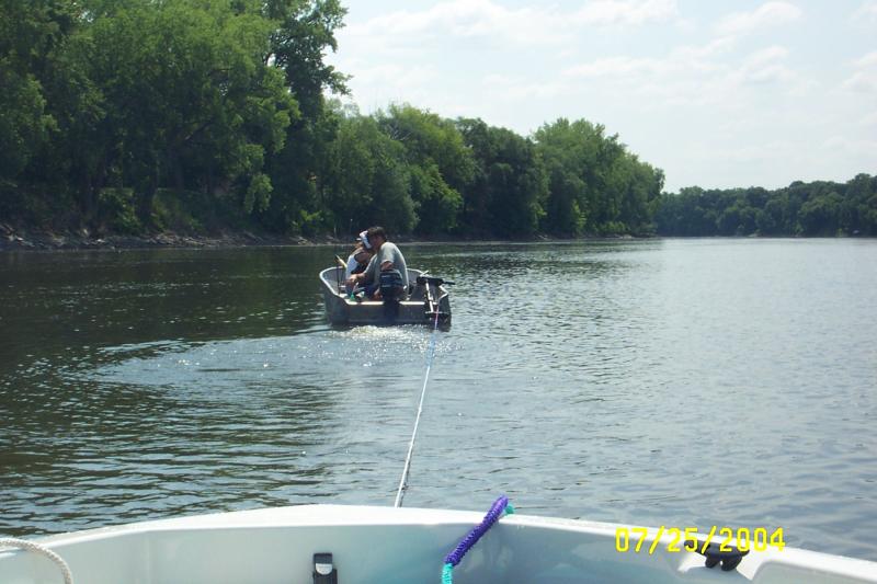 DCP_1256.JPG - Another dreaded rock lodged in the impeller between the hub and the wear ring. This couple kindly towed me back in.