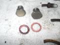 End plugs and annealed copper washers