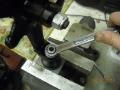 Assemble upper ball joints to vertical links