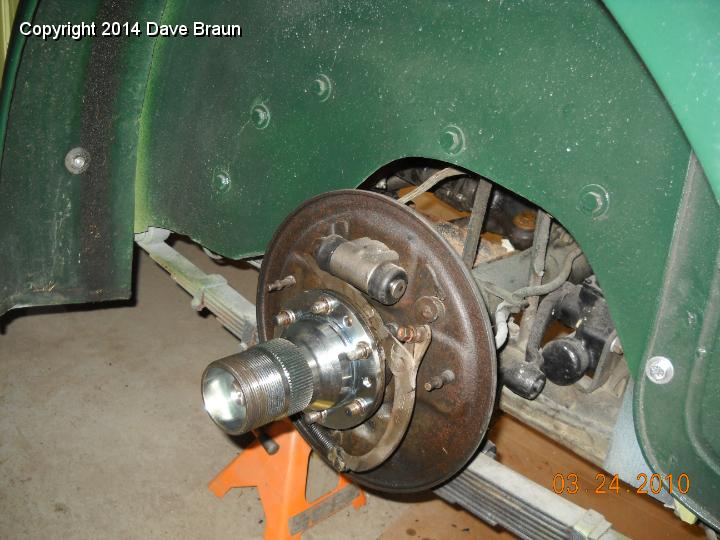 New axle tube nuts and shafts 06.jpg - Hubs in place