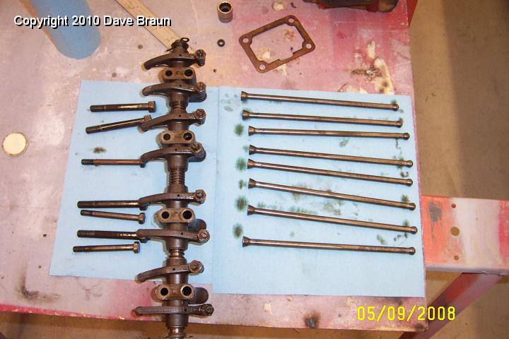 Rocker removed pushrods out.jpg - Pushrods and rocker shaft out for cleanup and de-watering.
