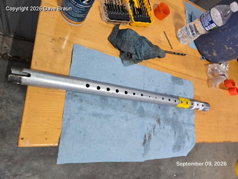 2026-09-09 17.31.37.jpg - Drilling adjustment holes in the inner section in steps. The holes need to be 5/16th of an inch in diameter