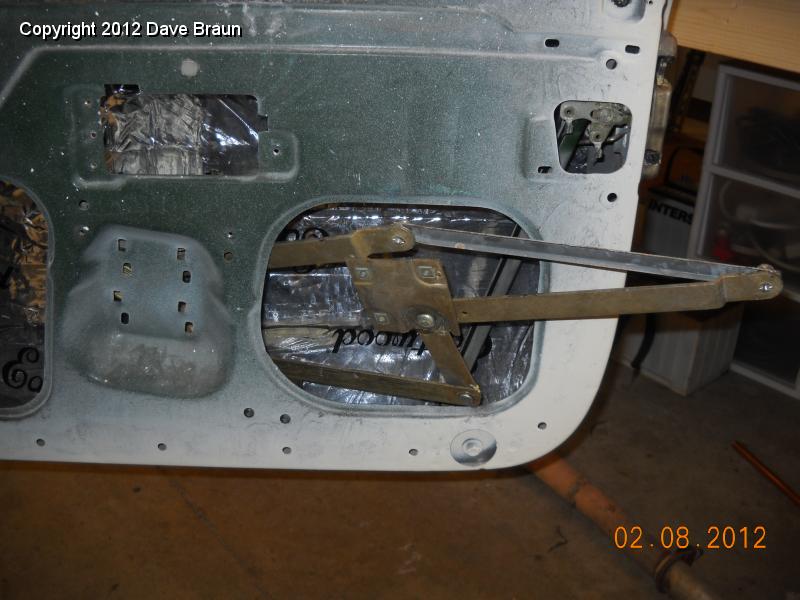 Loosen rear channel window first then feed in regulator.jpg