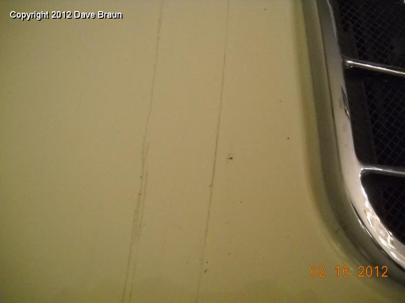 Pencil lines of dash top vinyl panel and front seal.jpg