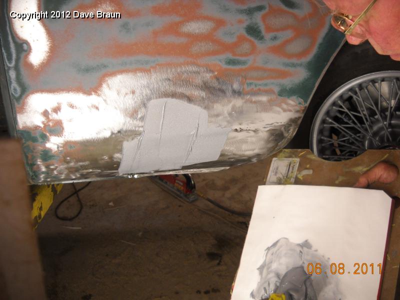 Applying metal to metal compound to RH wing patch.jpg