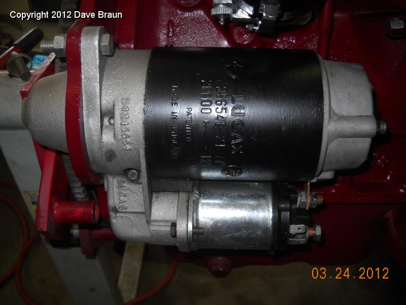 Starter installed with temporary bolt and nut.jpg