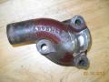 Ground off air pump bracket from water pump elbow