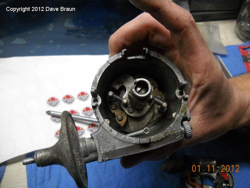 Jeff Schlemmer goes over the distributor 03.jpg - Worn points cam bushes, hammered stop arm on advance, weak low tension advance spring, no wonder this thing was 'hit and miss'.