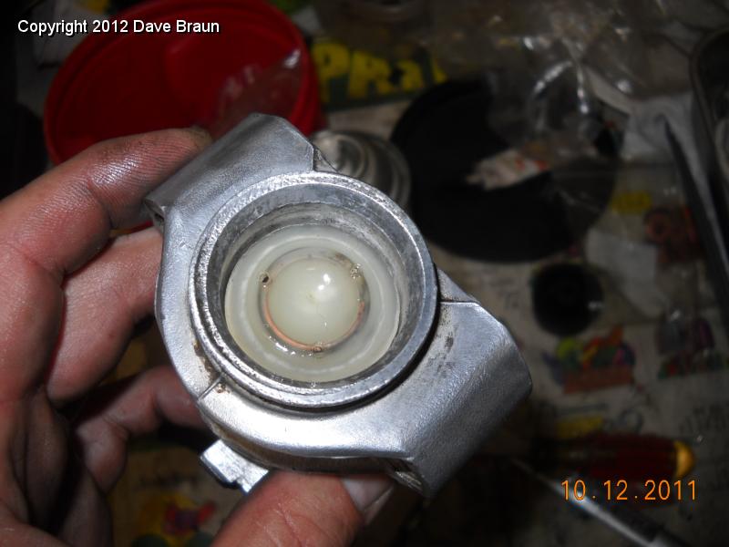 After spring is a valve assembly.jpg - Then insert a valve assembly