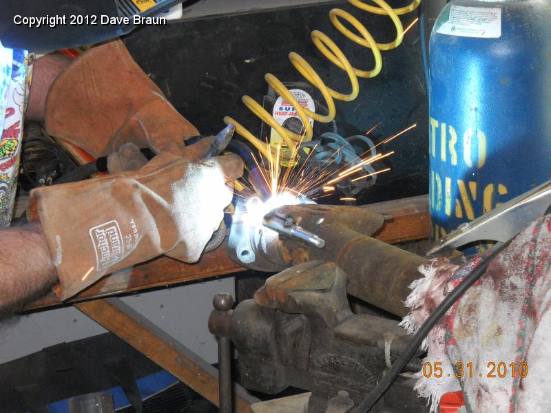 Welding on new rebound strap mounts 03.jpg