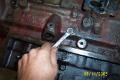 removing cam shaft bearing lock botls