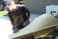 Gary sanding clear coat on wing