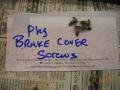 Parking brake cable cover screws